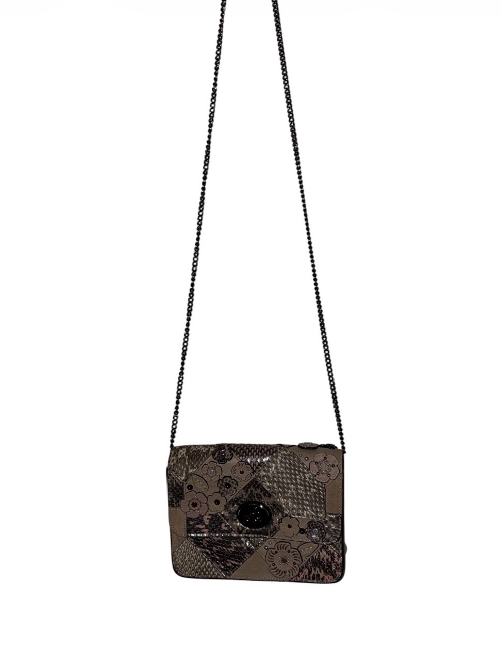Like new Coach Bowery crossbody features a textured patchwork design with chain.